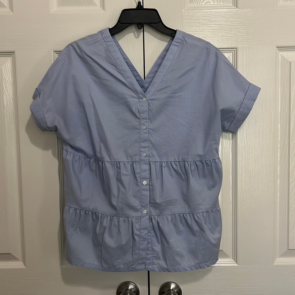 Blue button down blouse that’s the same in front and back